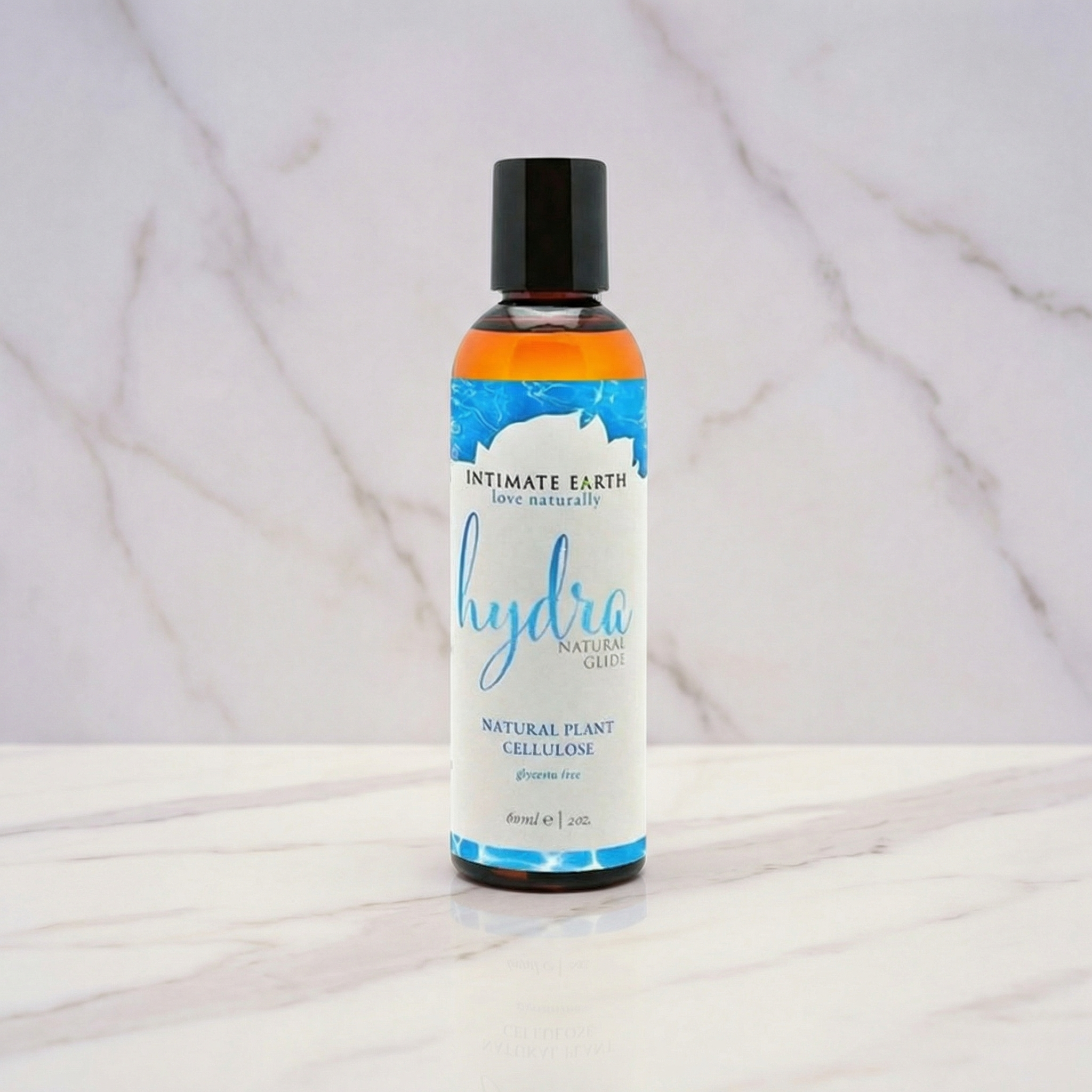 Intimate Earth Hydra Natural Glide amberkleurige fles glijmiddel op waterbasis 60 ml zwarte dop