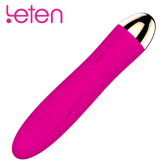 Leten Surge roze siliconen vibrator met goudkleurige top en bedieningsknoppen op witte achtergrond